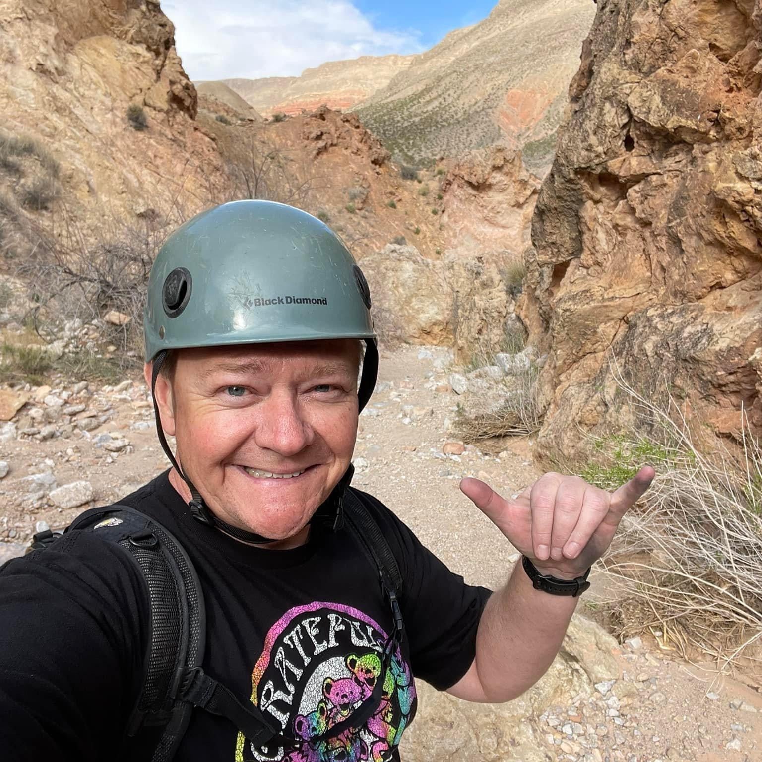 A customer of Airo Recovery, Greg P, smiling and feeling healthy out on a hike